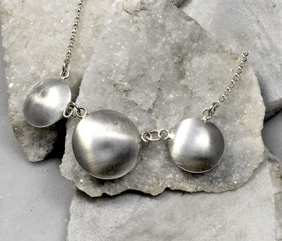 EMMA TALLACK JEWELRY —  Handcrafted Double-Domed, Brushed Sterling Silver, Triple Disc Pendant with Oxidized Centers
