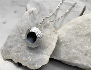 EMMA TALLACK JEWELRY —  Handcrafted Double-Domed, Brushed Sterling Silver, Hammer-Textured Pendant with Oxidized Center 